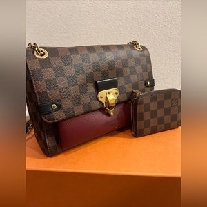 Louis Vuitton handbag with a wallet